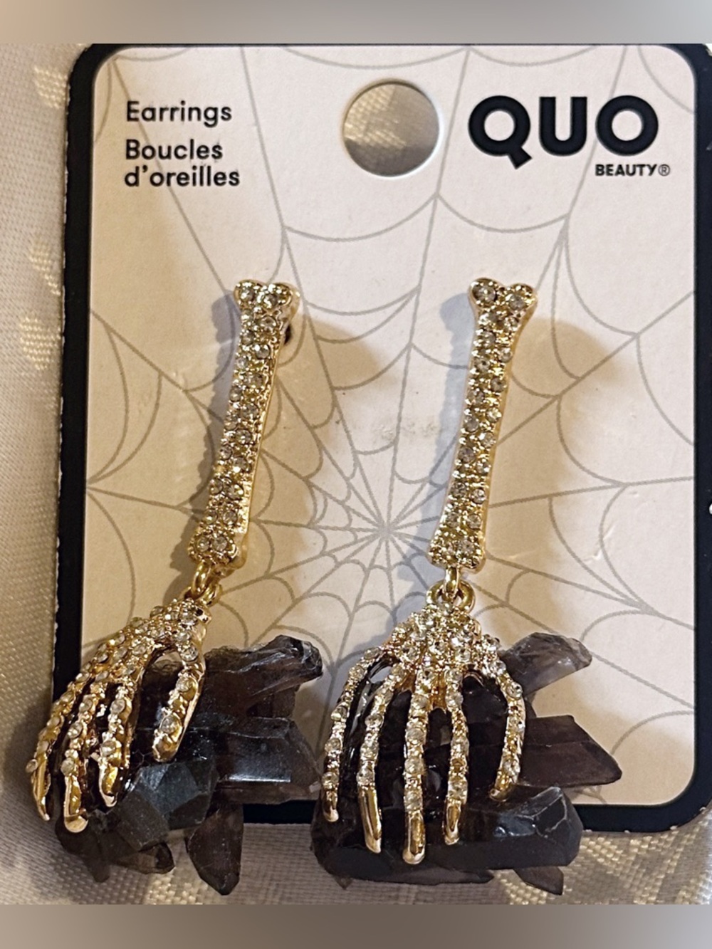 🆕 QUO - Crystal Skeleton Hand Drop Gold Earrings